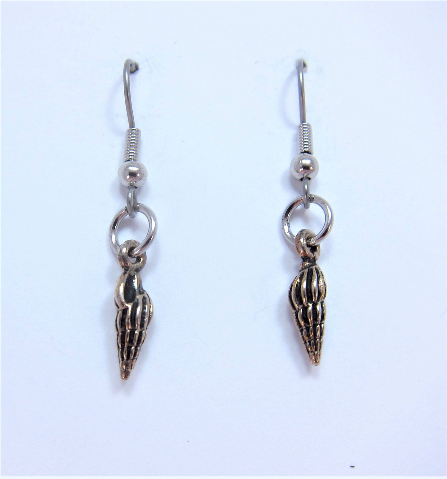 Charmed! Spiral sea shell earrings silver plate antique finish on hypoallergenic surgical steel hooks