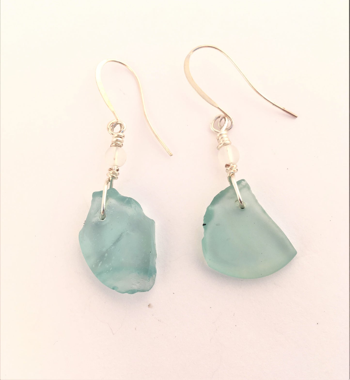 Crystal Earrings - Aqua sea glass from Bermuda with matt finish crystal bead on a hypoallergenic nickle-free hook