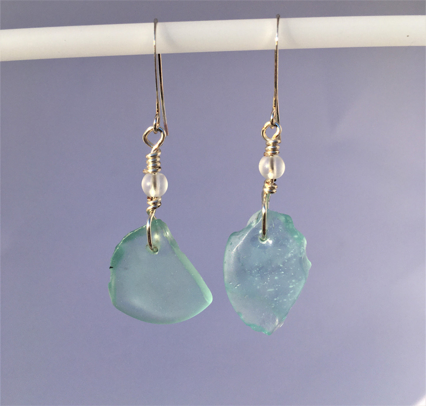 Crystal Earrings - Aqua sea glass from Bermuda with matt finish crystal bead on a hypoallergenic nickle-free hook