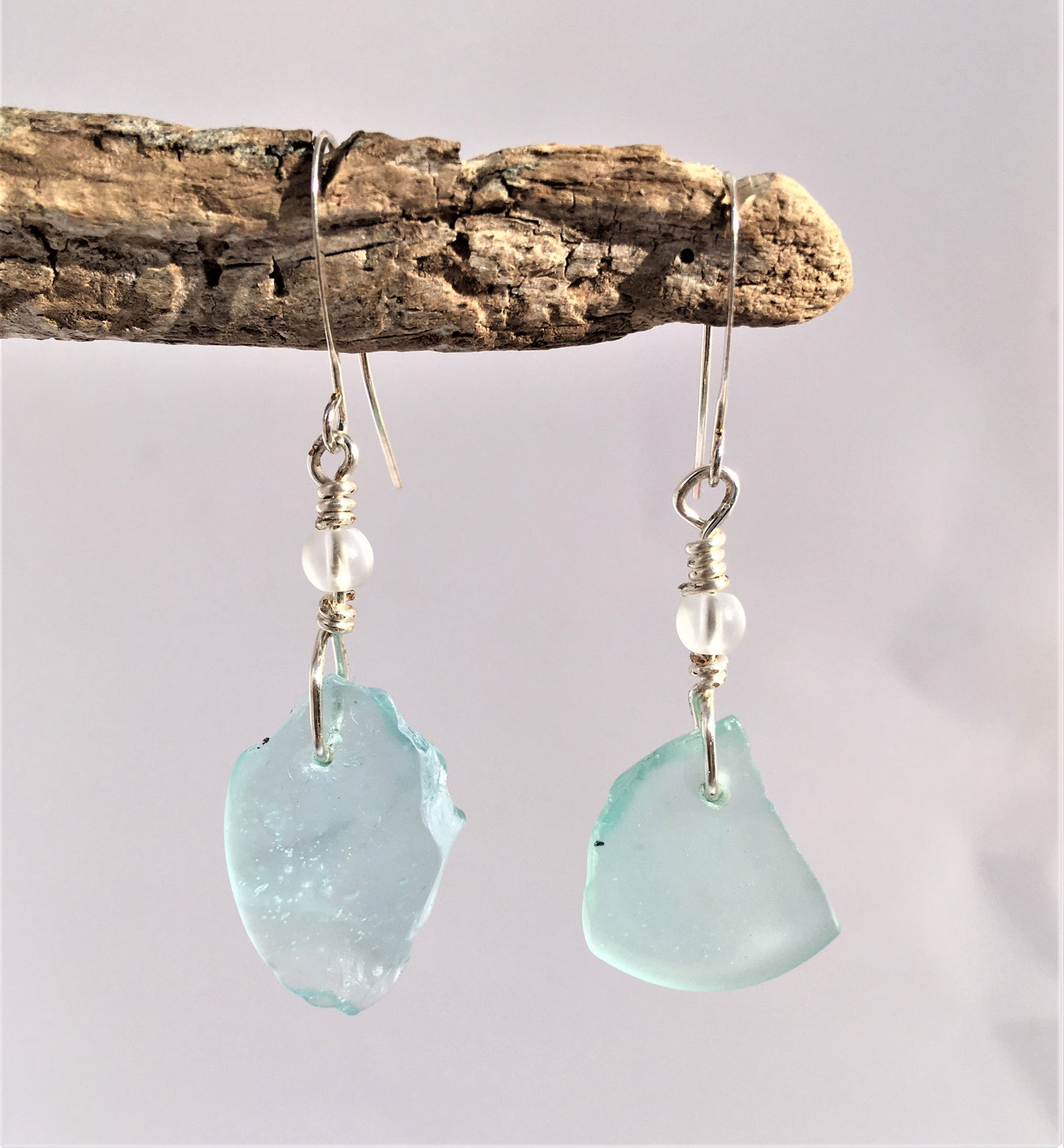 Crystal Earrings - Aqua sea glass from Bermuda with matt finish crystal bead on a hypoallergenic nickle-free hook