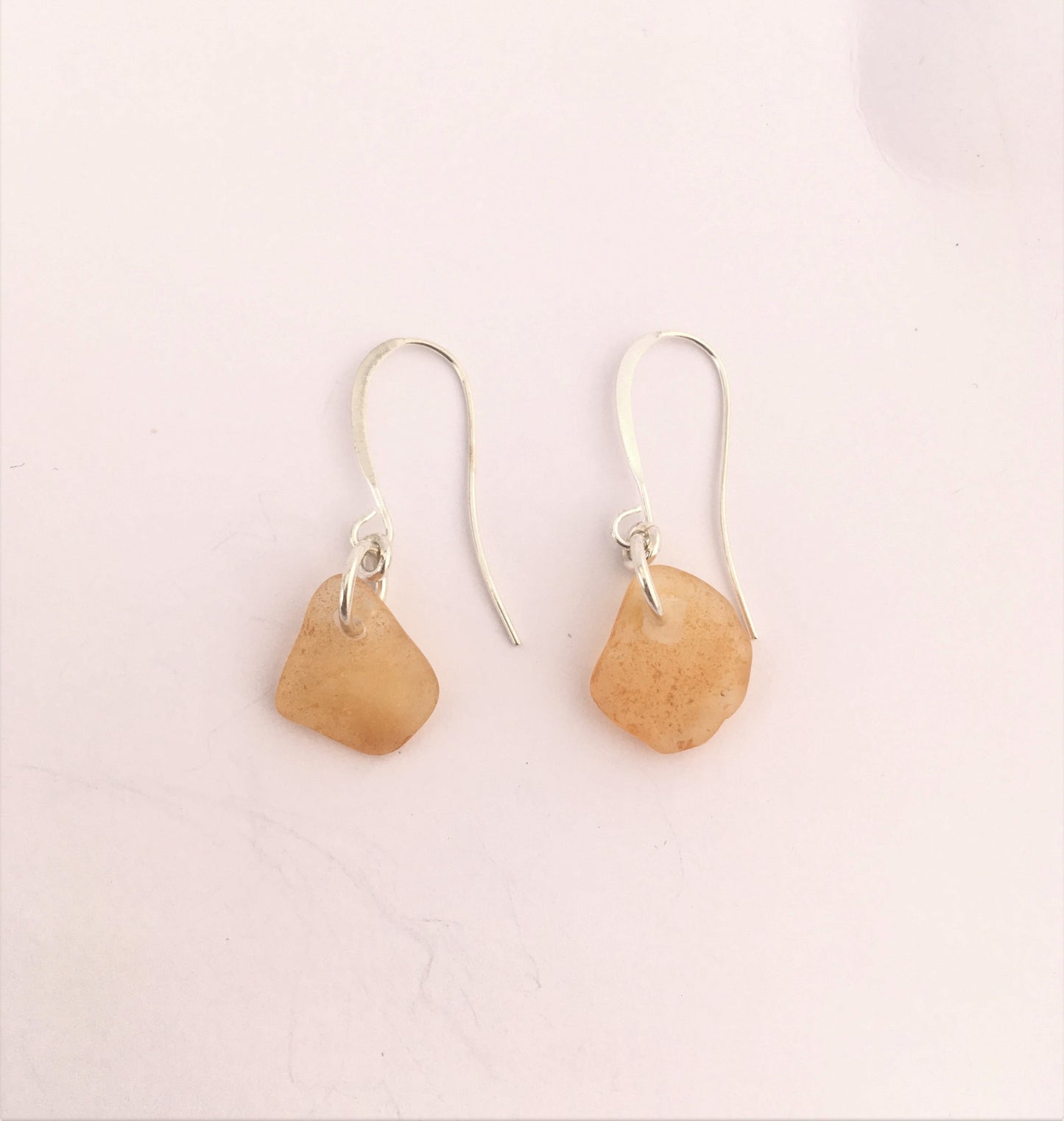 Shoreline Earrings: Rust colored sea glass from Northern California on a hypoallergenic nickle-free hook