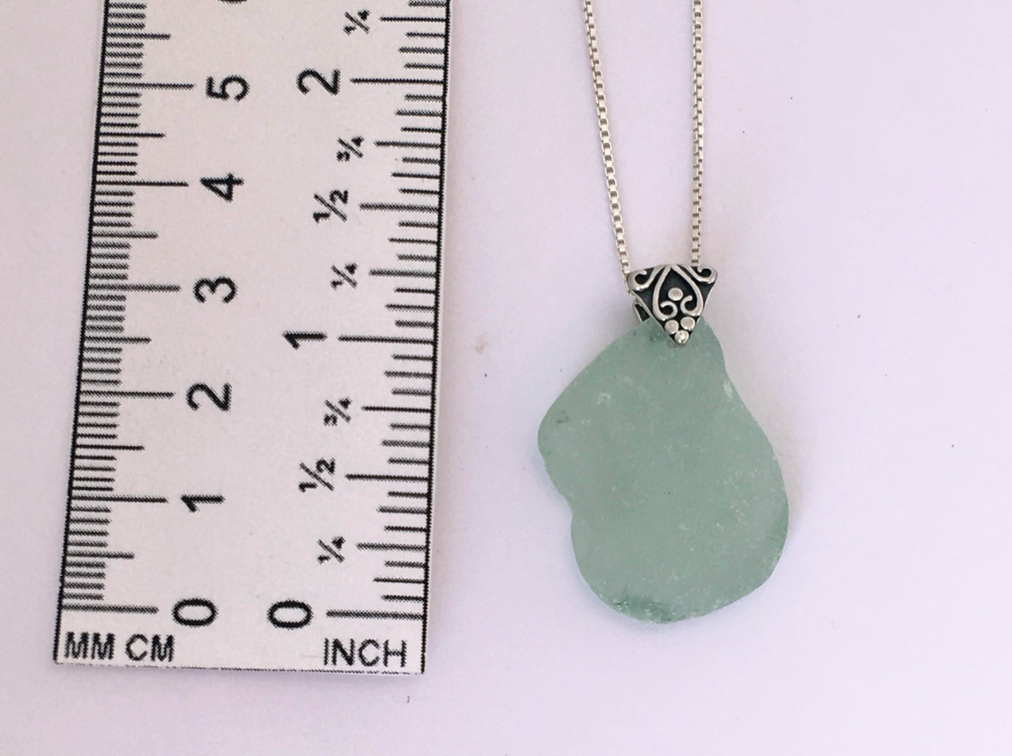 Shoreline Pendant - Aqua sea glass from Cape Breton, Nova Scotia, Canada with triangular Sterling silver bail with filigree motif in antique finish, on a boxchain