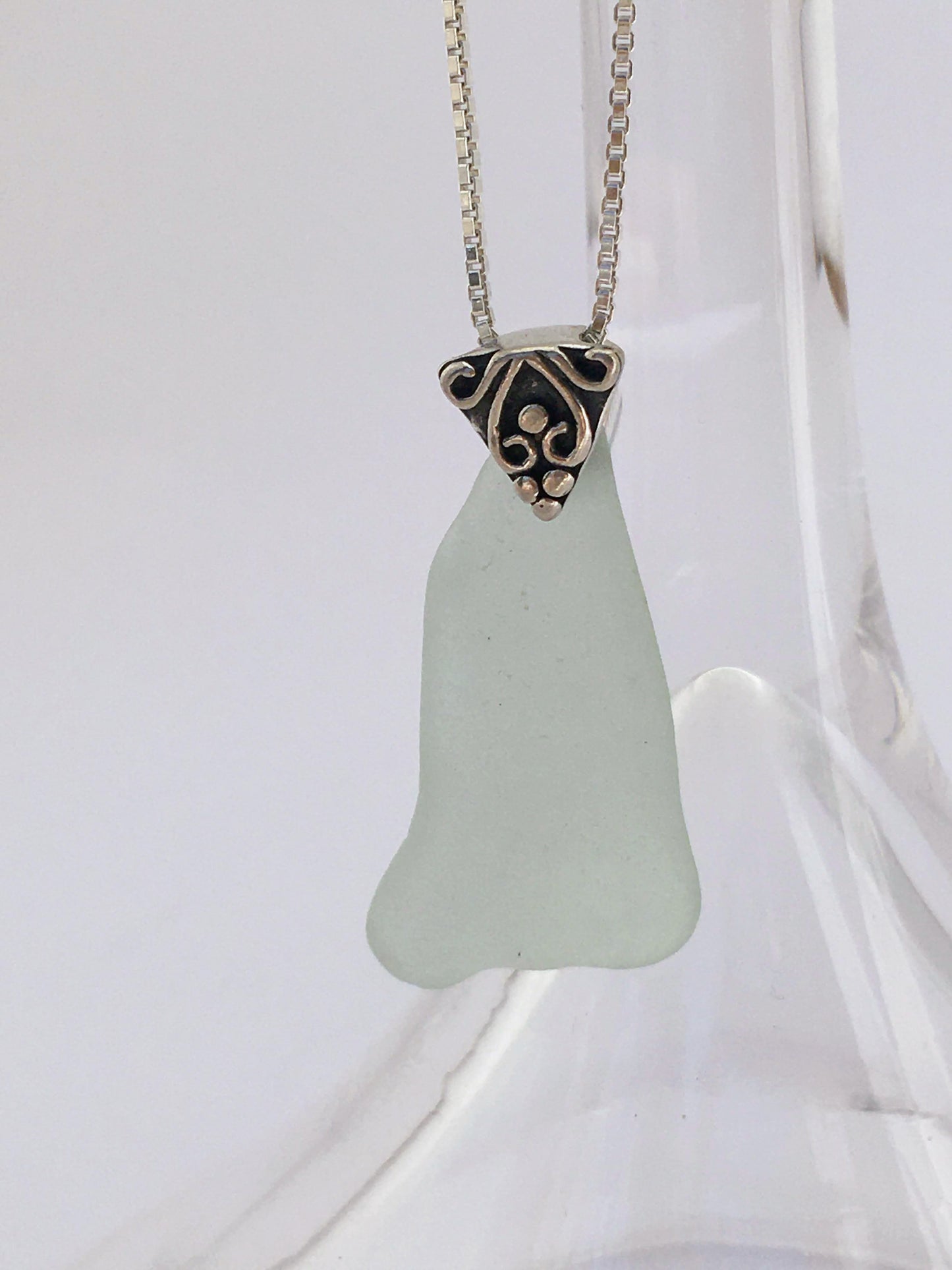 Shoreline Pendant - Pale aqua sea glass from Cape Breton, Nova Scotia, Canada with triangular Sterling silver bail with filigree motif in antique finish, on a boxchain