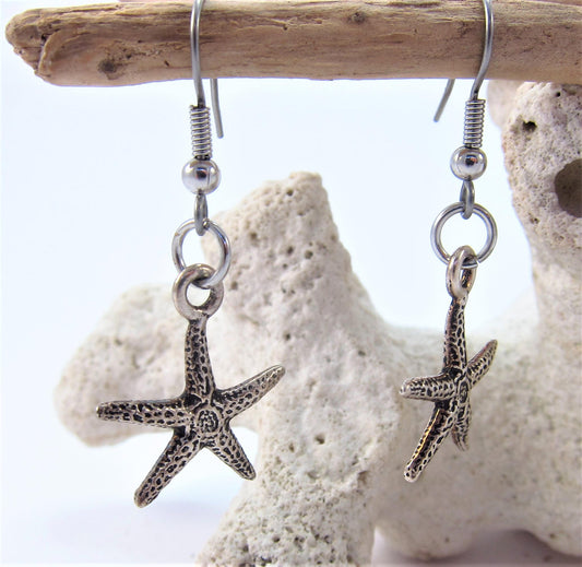 Charmed! Starfish / Sea star earrings silver plate antique finish on hypoallergenic surgical steel hooks