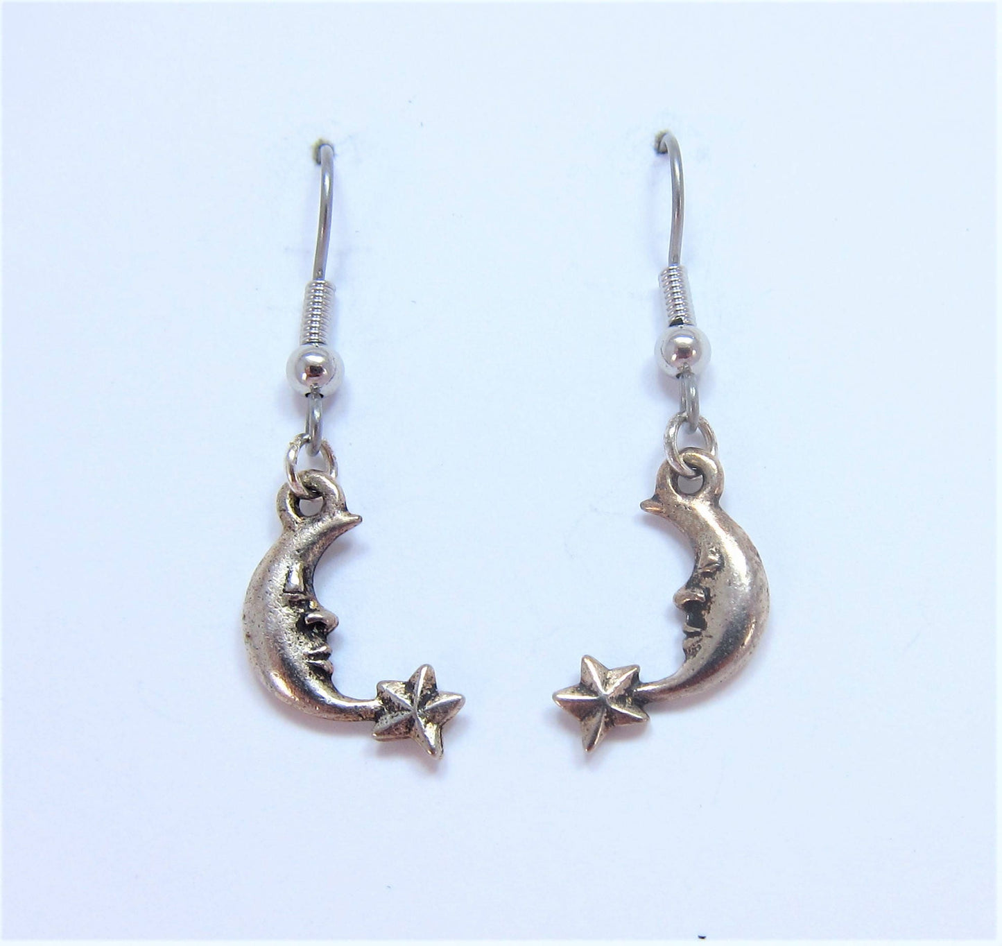 Charmed! Crescent moon earrings silver plate antique finish on hypoallergenic surgical steel hooks
