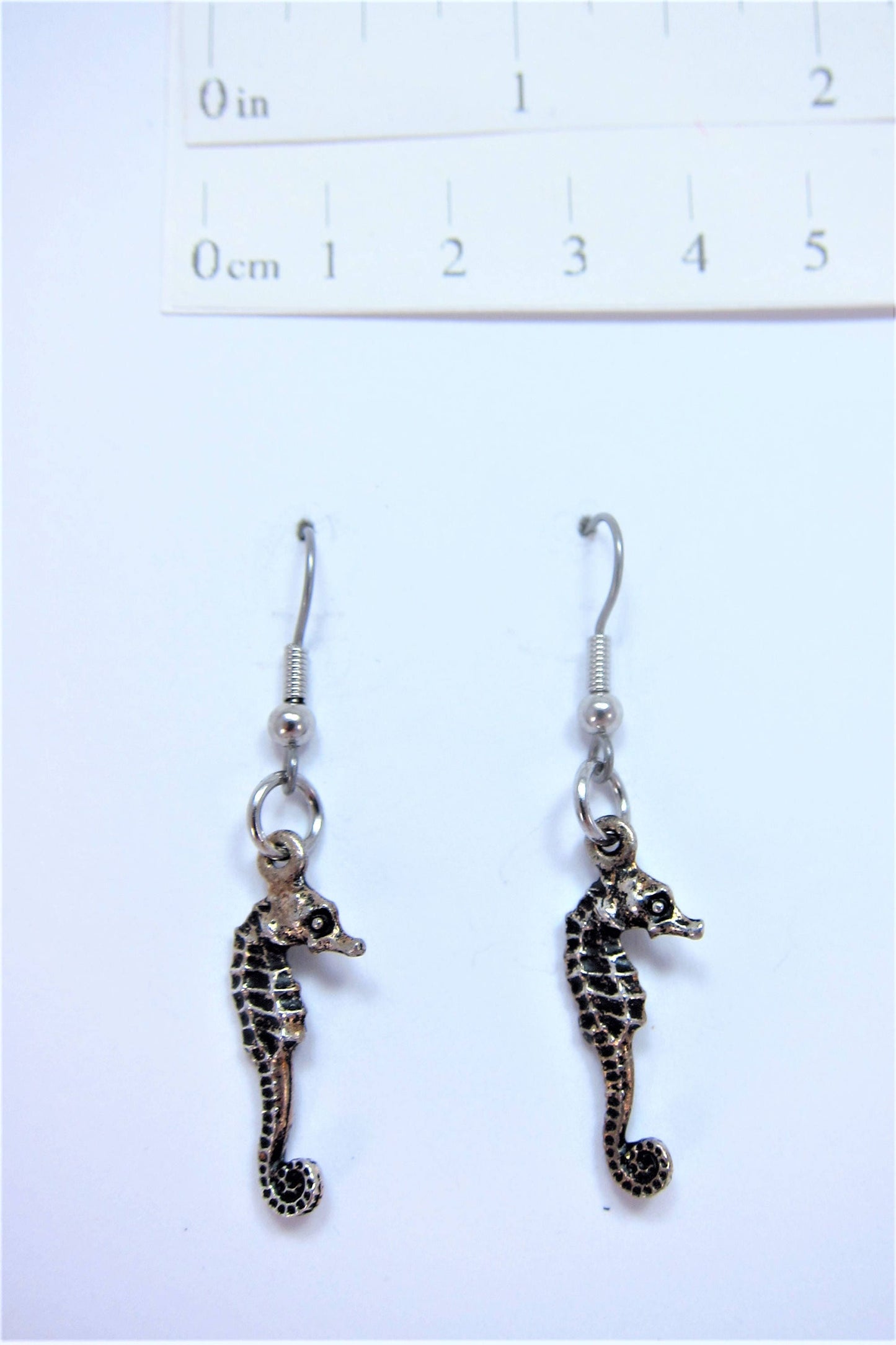 Charmed! Sea horse earrings silver plate antique finish on hypoallergenic surgical steel hooks