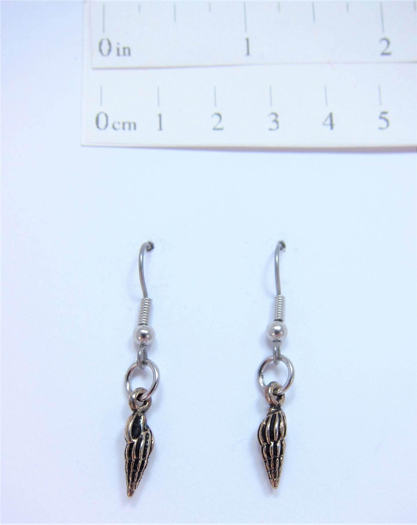 Charmed! Spiral sea shell earrings silver plate antique finish on hypoallergenic surgical steel hooks