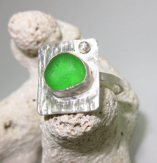 Handmade Sterling silver ring bezel set green sea glass from Nova Scotia, Canada on rectangular base with silver ball accent size 7.5