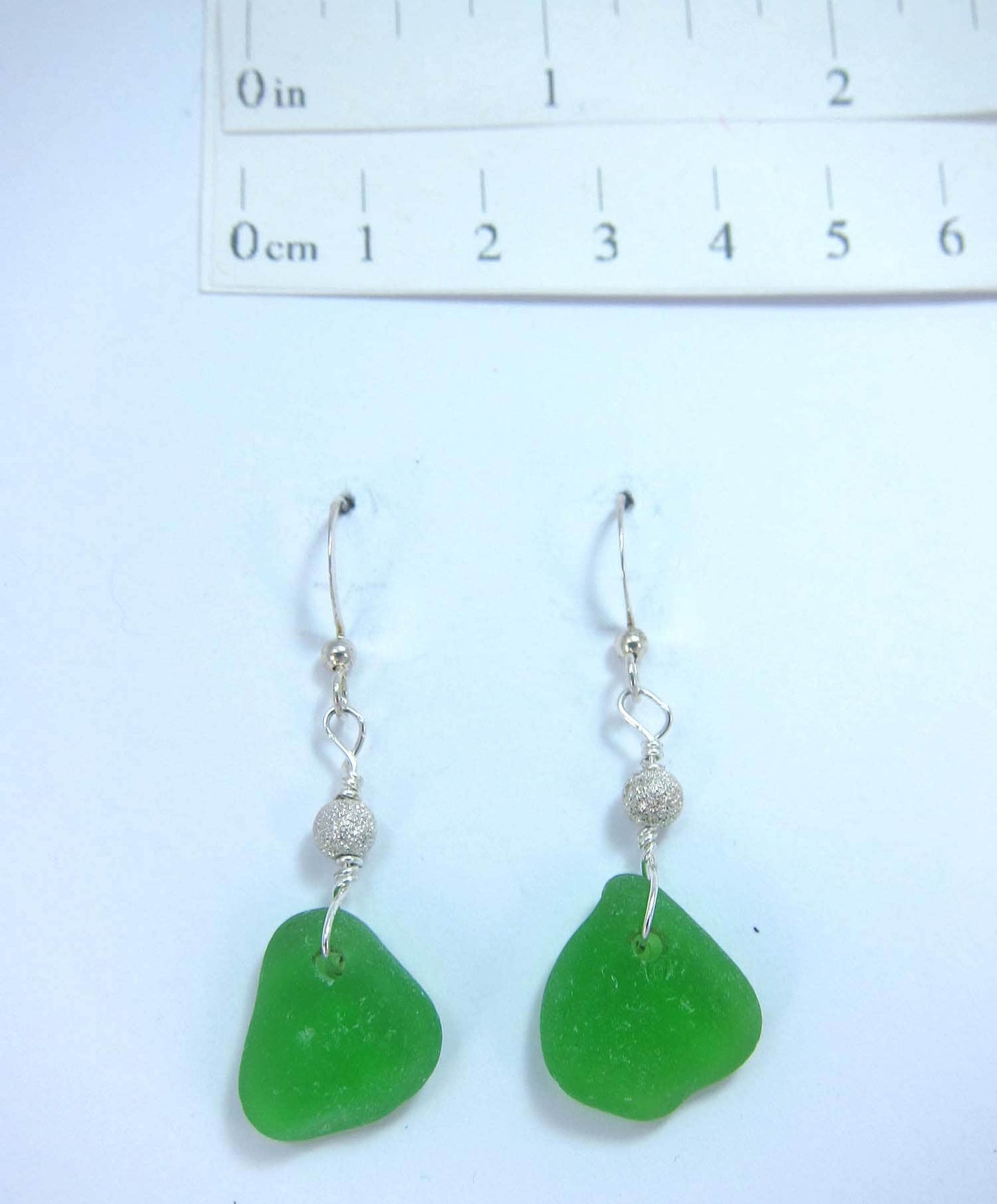 Stardust Earrings - Green sea glass from Cape Breton, Nova Scotia, Canada with Sterling silver bead on a nickle-free hook