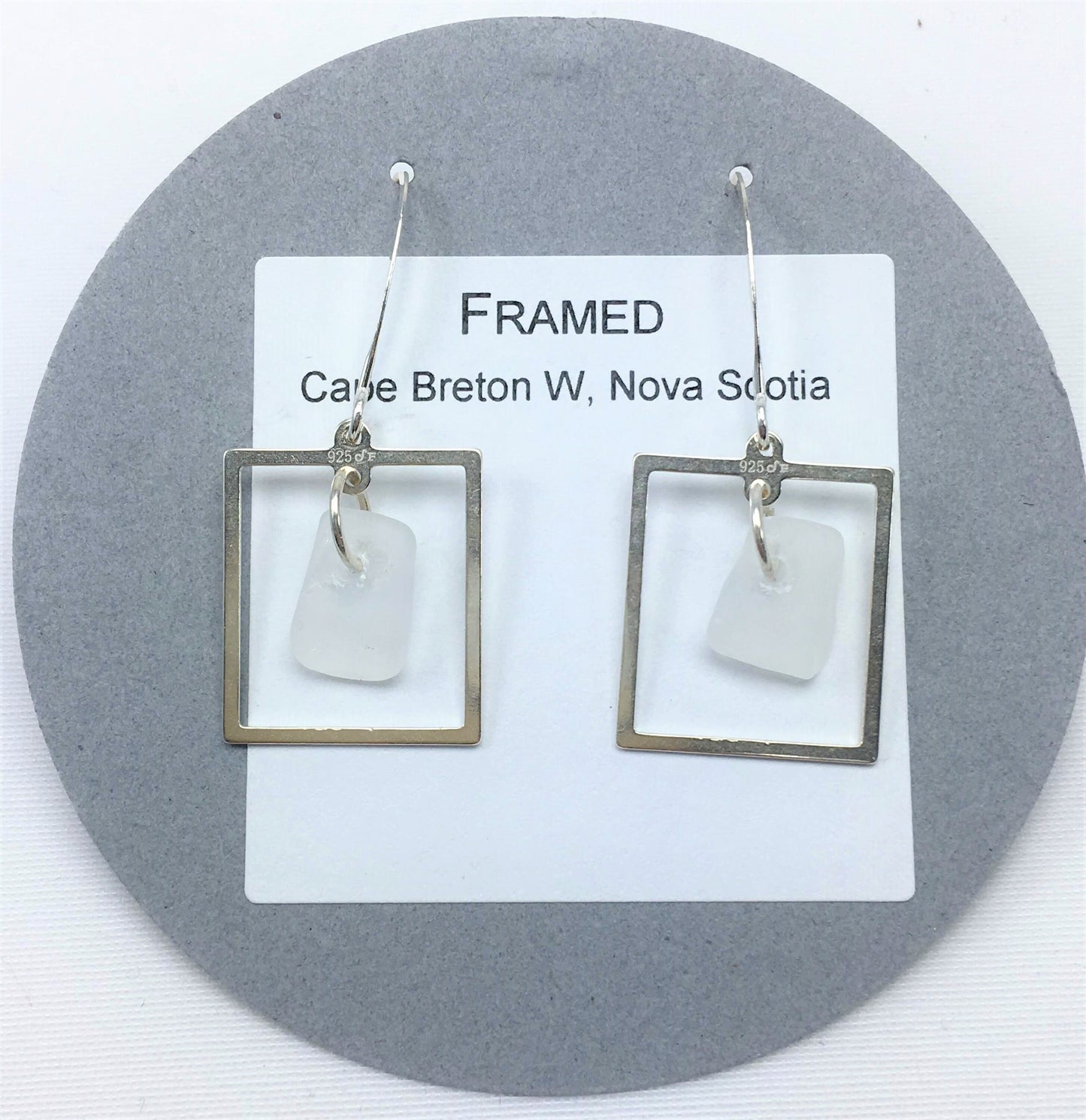 Framed! Earrings with white sea glass from Cape Breton, Nova Scotia, Canada framed in sterling silver on a nickle-free hook