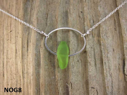 Heaven on Earth - Necklace with green Nova Scotia sea glass mounted on silverplate oval with silverplate chain