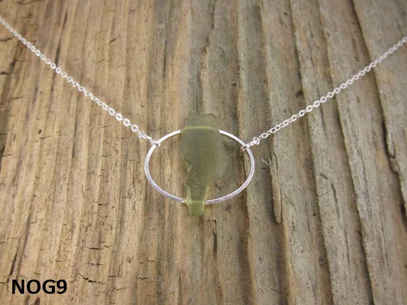 Necklace with green Nova Scotia sea glass mounted on silverplate oval with silverplate chain