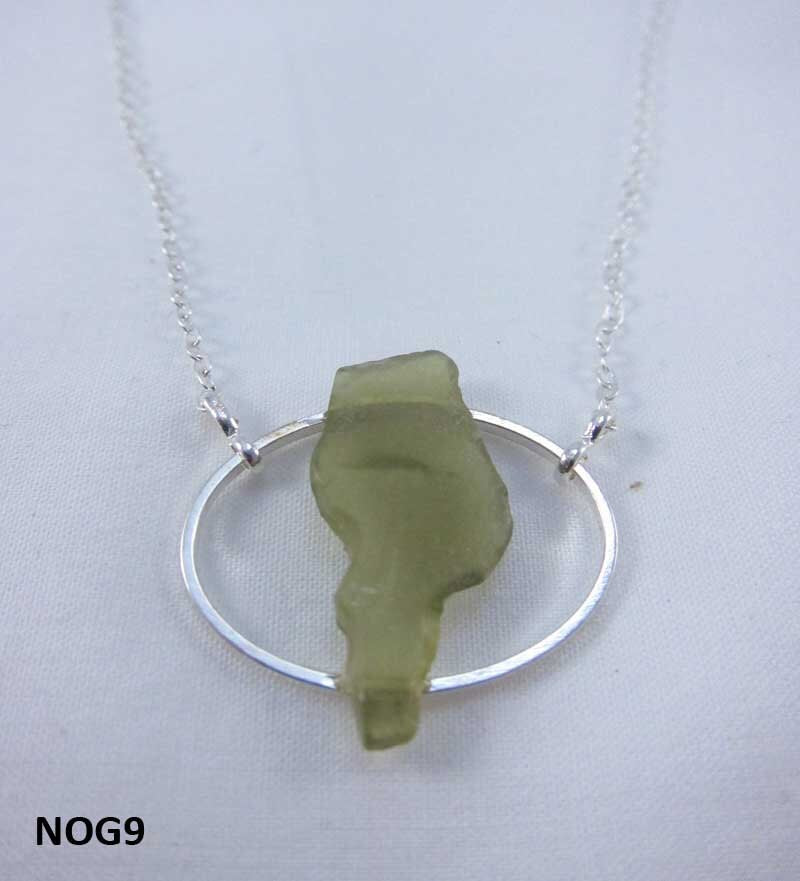 Necklace with green Nova Scotia sea glass mounted on silverplate oval with silverplate chain