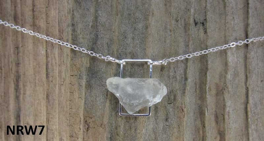 Necklace with white Nova Scotia sea glass mounted on silverplate rectangle with silverplate chain