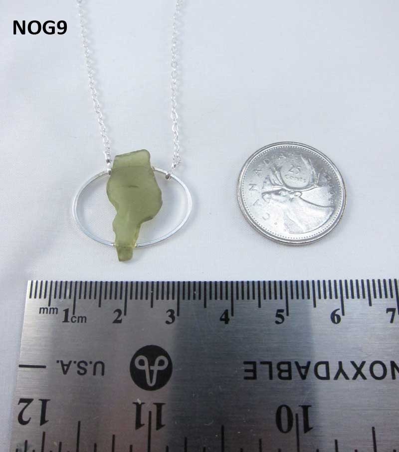 Necklace with green Nova Scotia sea glass mounted on silverplate oval with silverplate chain