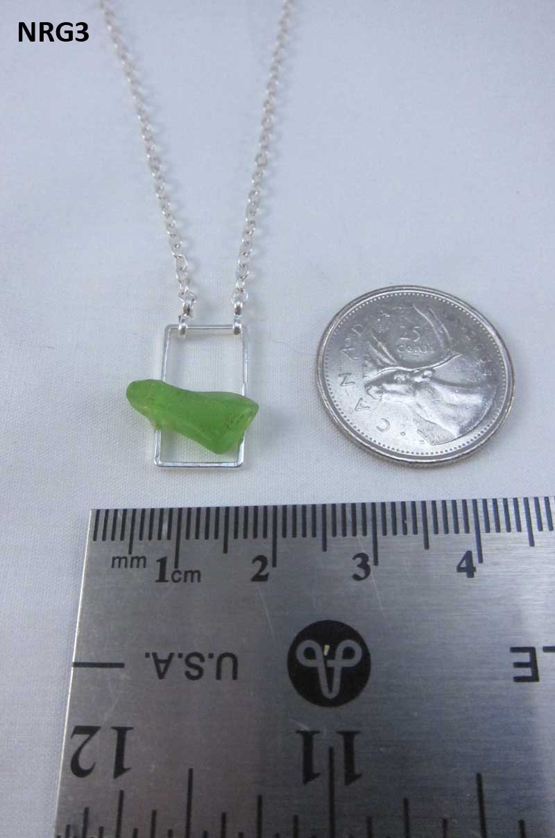 Necklace with green Nova Scotia sea glass mounted on silverplate rectangle with silverplate chain